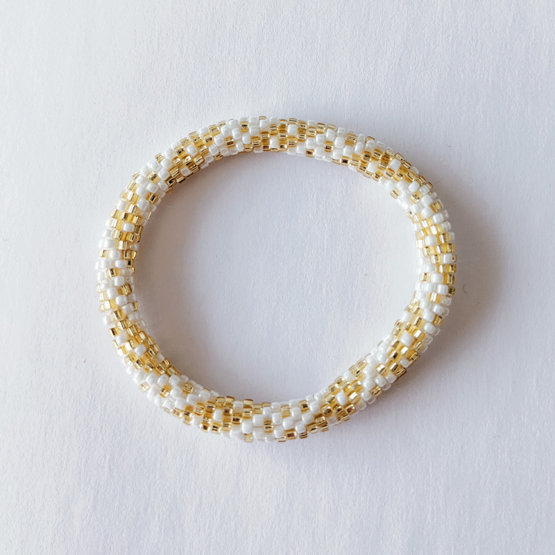 Bracelet népalais blanc et doré - Maia et Zoé