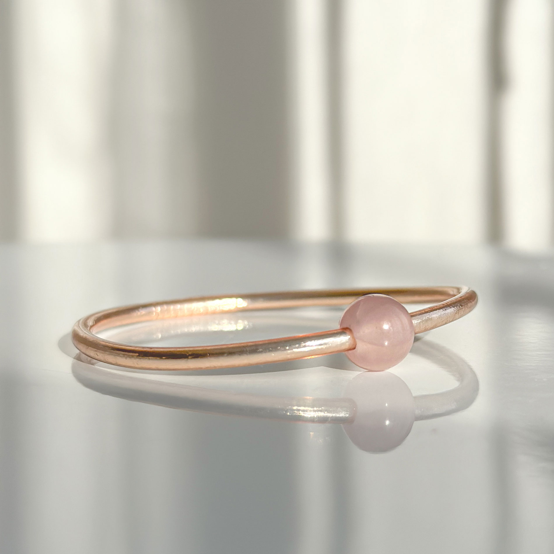 Jonc bouddhiste precious - champagne & quartz rose